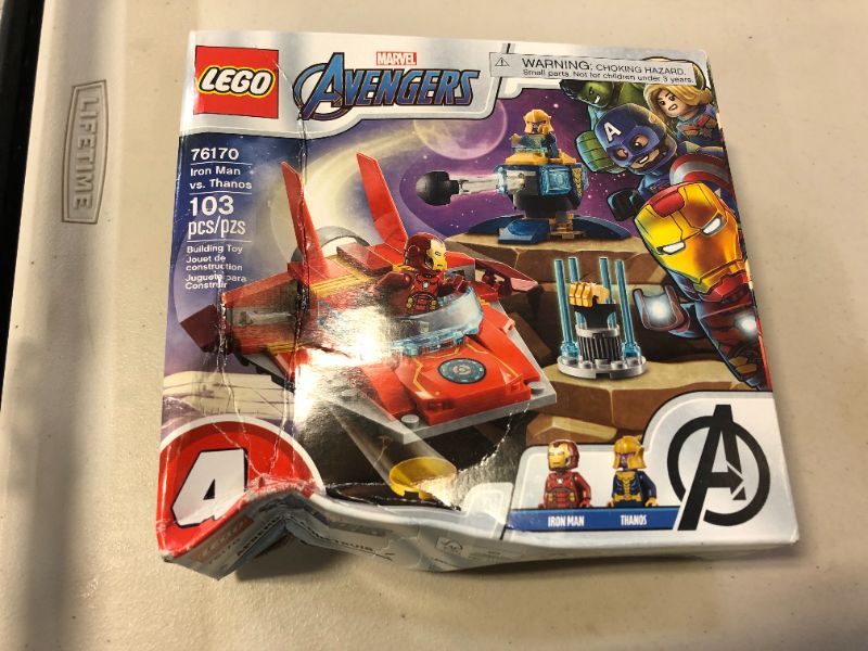 Photo 2 of LEGO Marvel Avengers Iron Man vs. Thanos 76170 Cool, Collectible Superhero Building Toy for Kids Featuring Marvel Avengers Iron Man and Thanos Minifigures, New 2021 (103 Pieces)
MAJOR SMASHES TO BOX