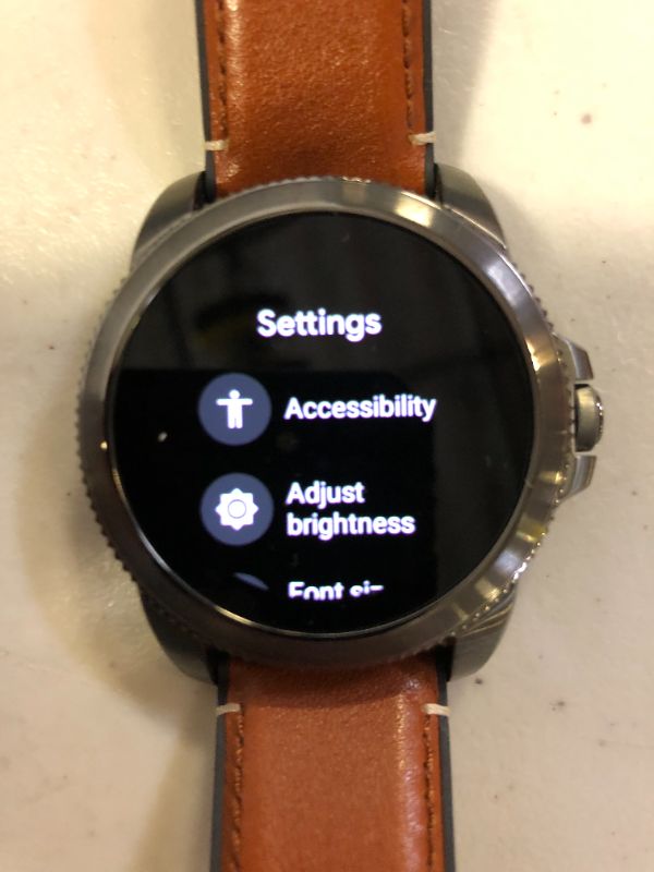 Photo 6 of Fossil Men's Gen 5E 44mm Stainless Steel Touchscreen Smartwatch with Speaker, Heart Rate, Contactless Payments and Smartphone Notifications
(MISSING BOX COVER), USED SWEAT MARKS ON WATCH BAND)