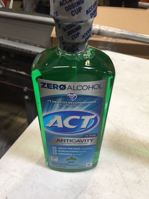 Photo 2 of ACT Anticavity Zero Alcohol Fluoride Mouthwash 18 fl. oz., With Accurate Dosing Cup, Mint
