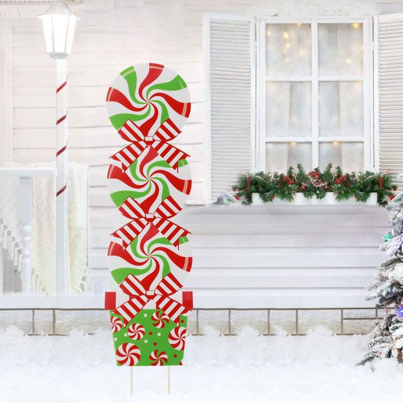 Photo 1 of Acedining Candy Christmas Decorations Outdoor - Giant Holiday Decor Signs for Home Lawn Pathway Walkway Candyland Themed Party - 42 Inch Peppermint Xmas Yard Sign Stakes
