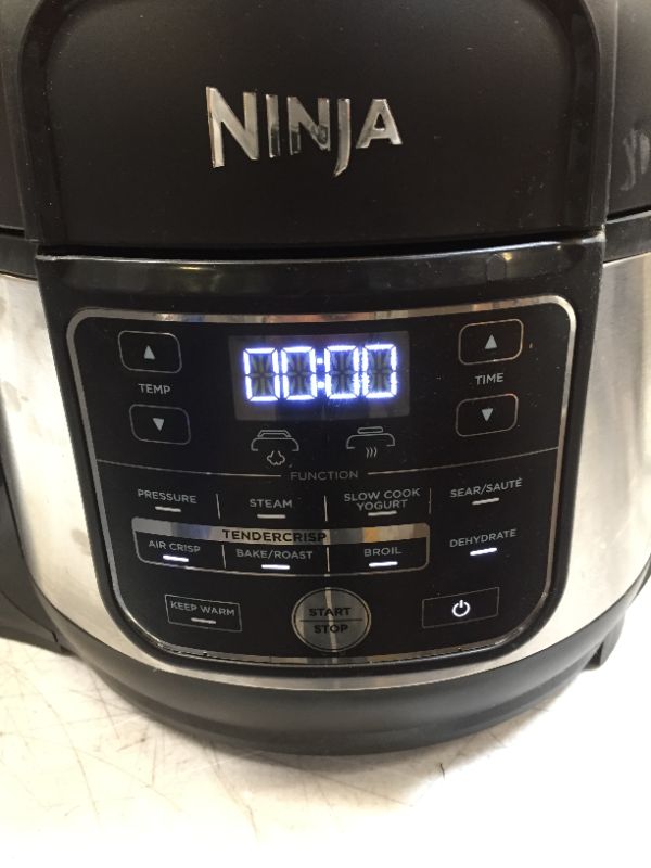 Photo 1 of Ninja FD302 Foodi 11-in-1 Pro 6.5 qt. Pressure Cooker & Air Fryer that Steams, Slow Cooks, Sears, Sautés, Dehydrates & More, with 4.6 qt. Crisper Plate, Nesting Broil Rack & Recipe Book, Silver/Black