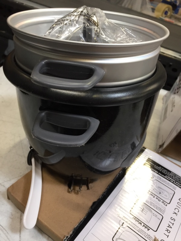Photo 1 of Aroma 6-Cup Pot-Style Rice Cooker and Food Steamer, Black