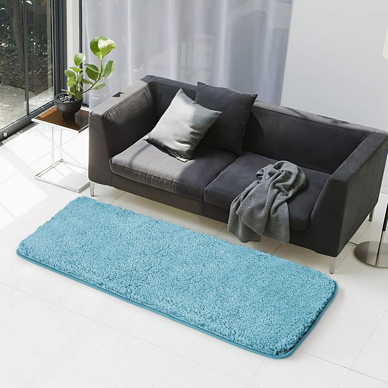 Photo 1 of Bath Rug COSY HOMEER 60x24 Inch (NOT 40x60),Non-Slip Soft Thickness Shaggy Water Absorbent Bathroom Carpet,Machine Washable Rectangular Runner Area Rug Mats for Floor Kitchen(Sky Blue)