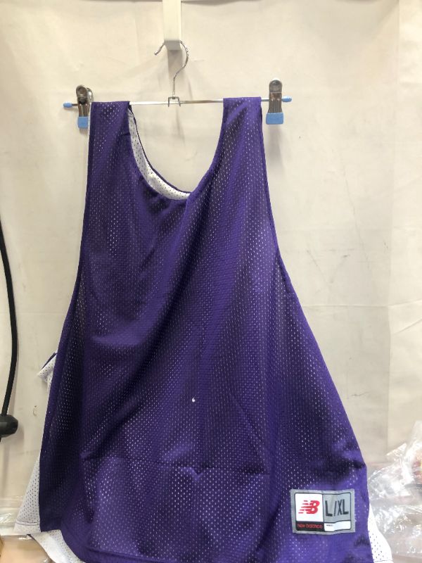 Photo 1 of new balance scrimmage jersey size large/xl 