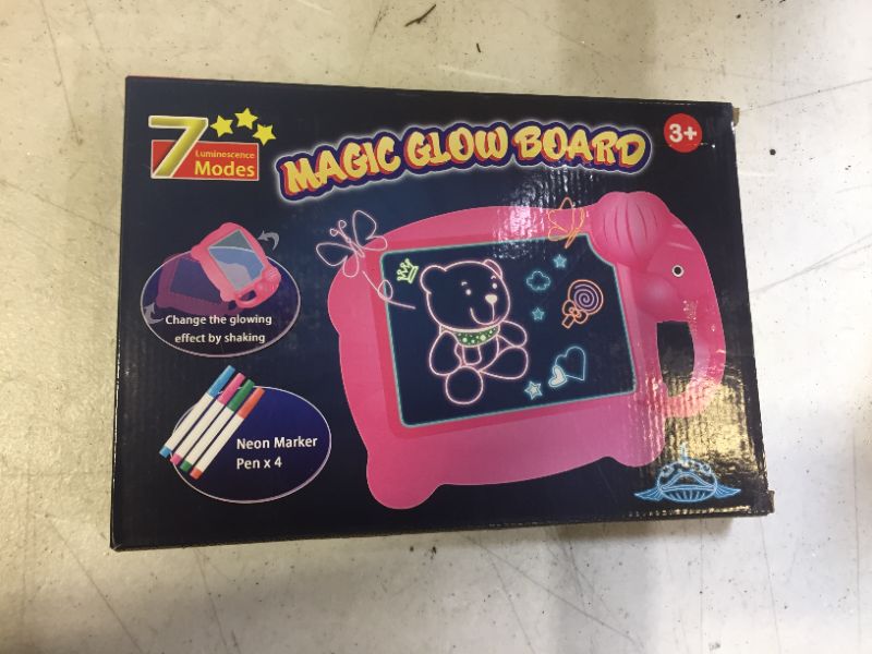 Photo 2 of Magic Glow Board Craft Kit Light Up Drawing Board with Neon Effect Drawing Board and 4 Fluorescent Magic Pens for Kids Age 3+
