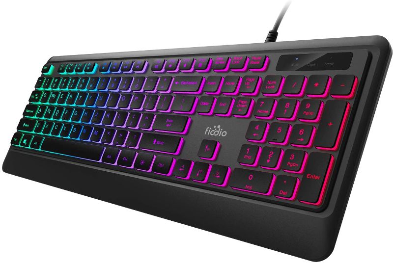 Photo 1 of Fiodio Rainbow Membrane Gaming Keyboard, Quiet Wired Computer Keyboard, 104 Silent Keys, 26 Anti-Ghosting Keys, Spill Resistant, Multimedia Control for PC and Desktop
