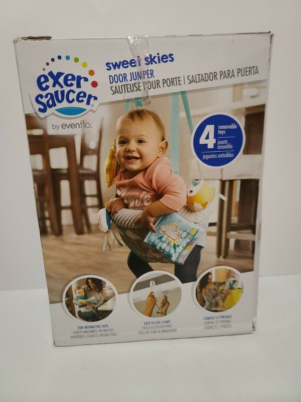 Photo 1 of Evenflo Door Jumper with 4 Removable Toys, Sweet Skies.
