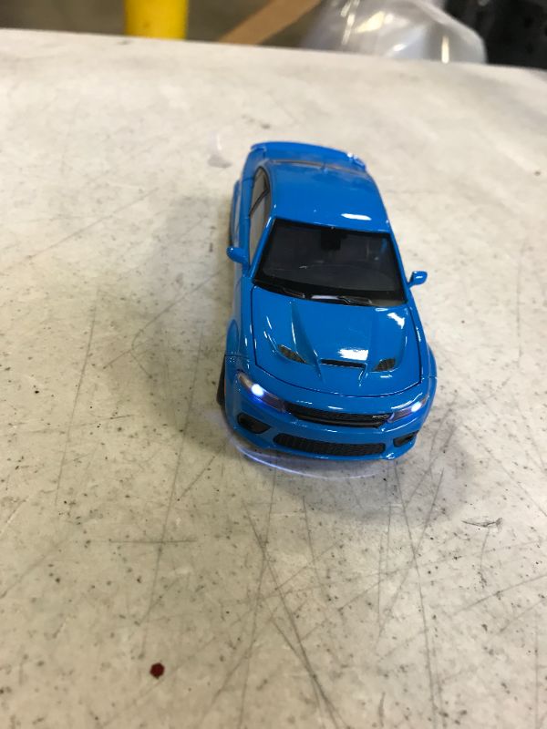 Photo 2 of blue die cast charger hellcat with working lights and sounds 