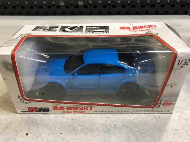 Photo 1 of blue die cast charger hellcat with working lights and sounds 