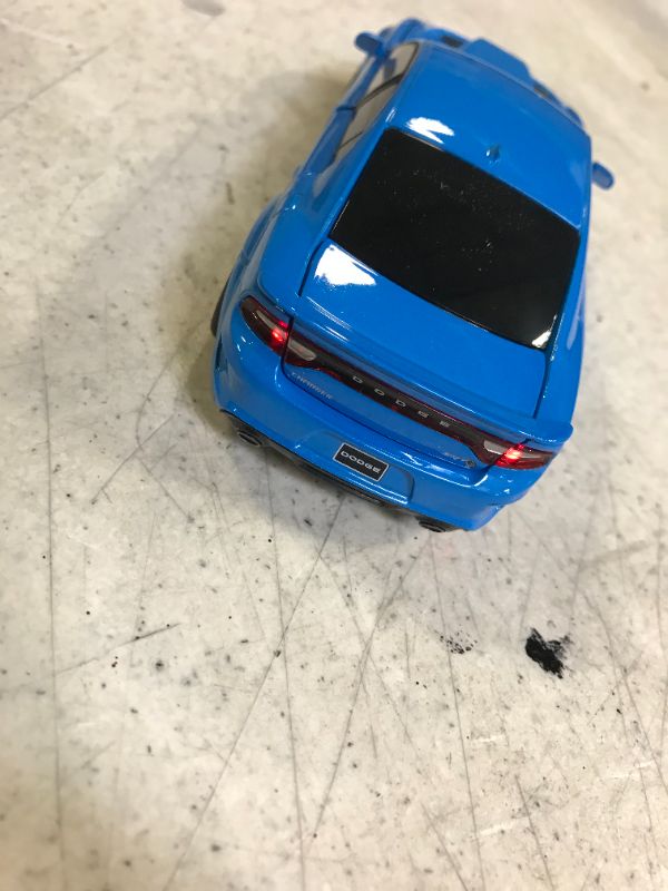 Photo 4 of blue die cast charger hellcat with working lights and sounds 