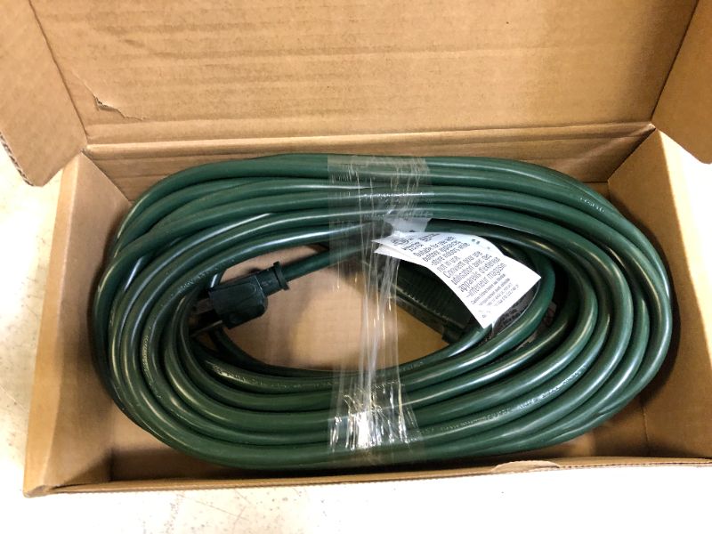 Photo 1 of AmazonBasics 16/3 Vinyl Outdoor Extension Cord -50FT green 