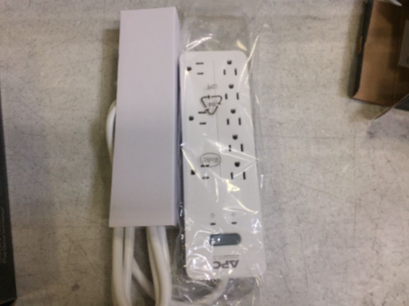 Photo 2 of APC Surge Protector, White Power Strip PH8W, 2160 Joules, Flat Plug, 8 Outlet Power Strip
