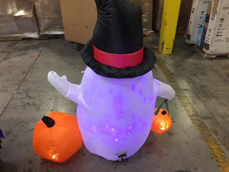 Photo 3 of GIMIYAA 5FT Halloween Inflatables Colorful dimming LED Light Ghost,Holding Pumpkin Blow Up Inflatables for Halloween Party Indoor,Outdoor,Tree,Yard,Garden,Lawn Decorations (Inflatable Decoration)
