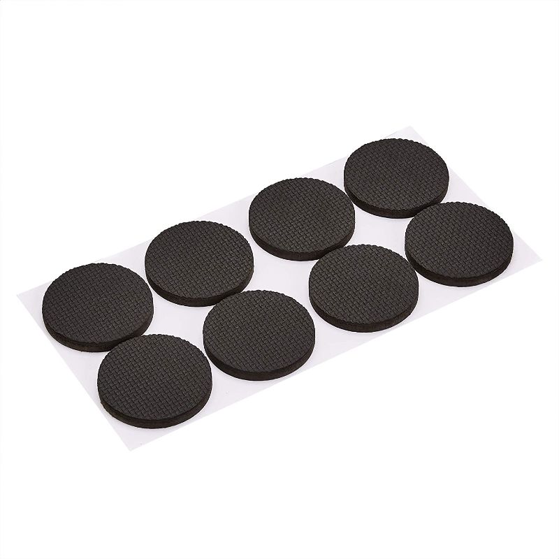 Photo 1 of 2 PACK Amazon Basics Rubber Furniture Pads, Black, 2'' Round, 8 pcs -- 16 PCS