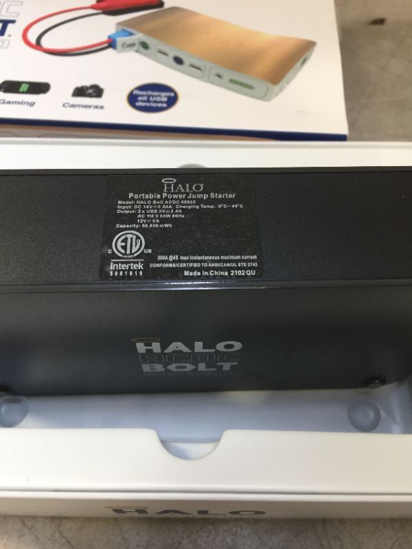 Photo 1 of HALO Bolt 58830 mWh Portable Phone Laptop Charger Car Jump Starter with AC Outlet and Car Charger - Grey
