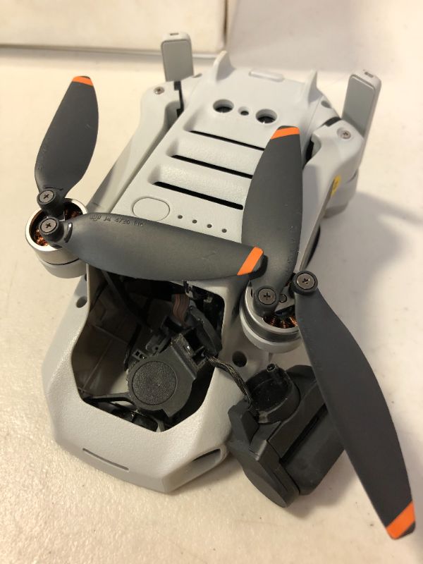 Photo 4 of DJI Mini 2 – Ultralight and Foldable Drone Quadcopter (parts only, major damages to item and packaging, missing pieces)