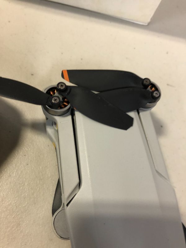 Photo 3 of DJI Mini 2 – Ultralight and Foldable Drone Quadcopter (parts only, major damages to item and packaging, missing pieces)