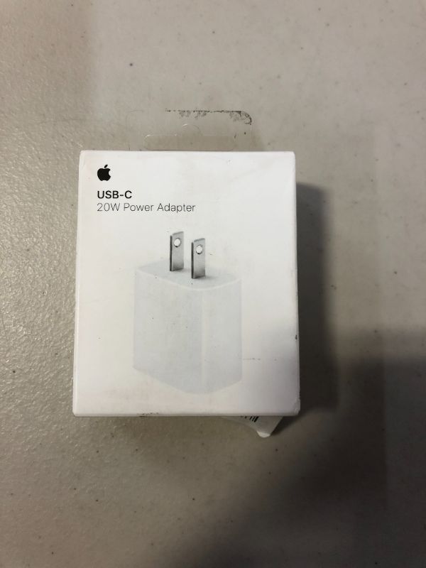 Photo 2 of APPLE USB-C 20W POWER ADAPTER (FACTORY SEALED SHUT, STICKER ON ITEM COVERING UPC CODE)