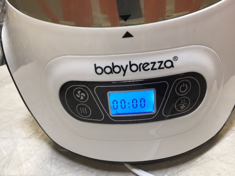 Photo 3 of Baby Brezza Baby Bottle Sterilizer and Dryer Machine – Electric Steam Sterilization - Universal Fit - Pacifiers, Glass, Plastic, and Newborn Feeding Bottles
