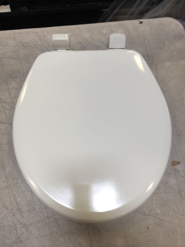 Photo 2 of MAYFAIR 848SLOWB 000 Toilet Seat will Slow Close, Never Loosen and Easily Remove, ROUND, Durable Enameled Wood, White
