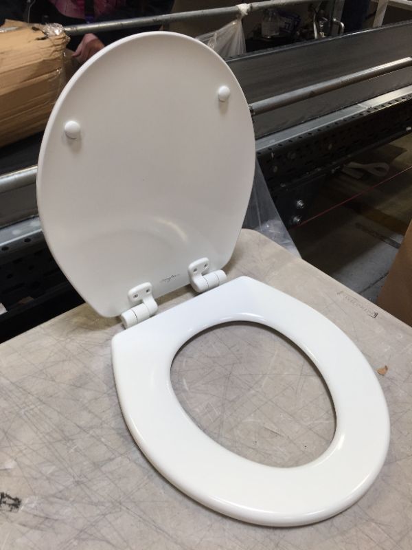 Photo 3 of MAYFAIR 848SLOWB 000 Toilet Seat will Slow Close, Never Loosen and Easily Remove, ROUND, Durable Enameled Wood, White
