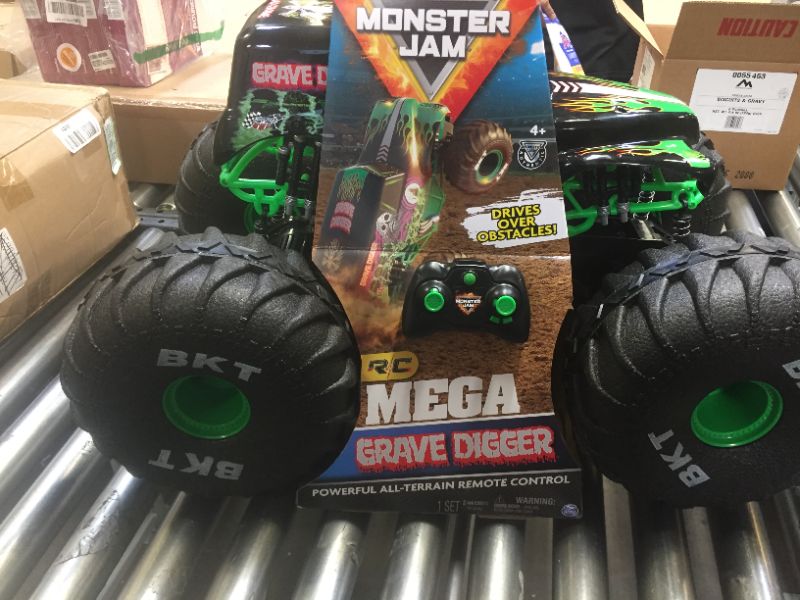 Photo 2 of Monster Jam Official Mega Grave Digger All-Terrain Remote Control Monster Truck with Lights - 1:6 Scale