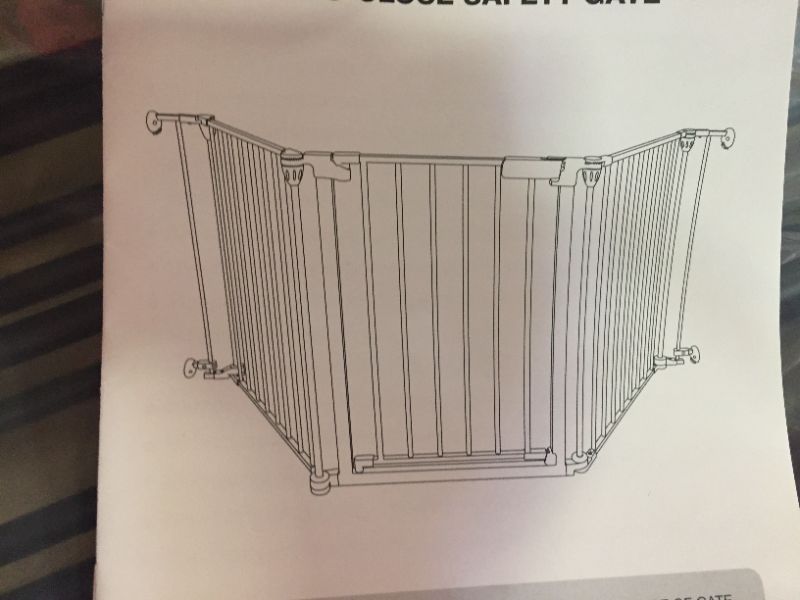 Photo 1 of auto-close pet gate 