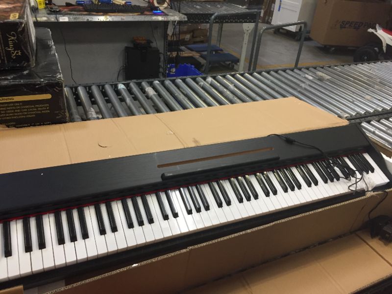 Photo 1 of 88 key electric piano