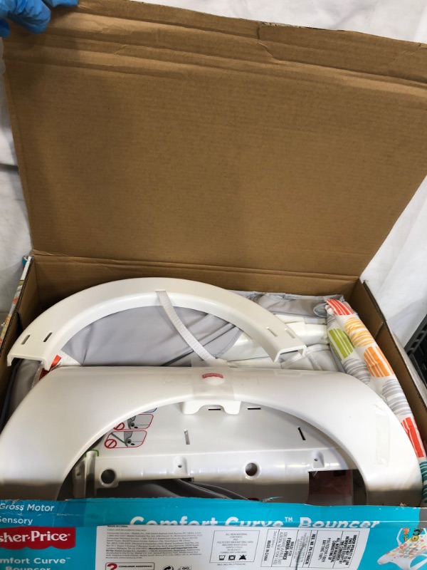 Photo 1 of Fisher-Price Comfort Curve Bouncer with a Removable Toy Bar
