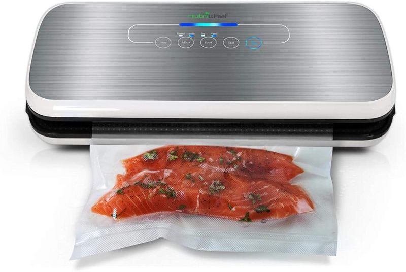 Photo 1 of NutriChef PKVS Sealer | Automatic Vacuum Air Sealing System Preservation w/Starter Kit | Compact Design | Lab Tested | Dry & Moist Food Modes | Led Indicator Lights, 12", Silver
