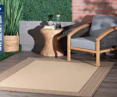 Photo 1 of Beige Indoor/Outdoor Gris border Area Rug
7'6"x10'9"