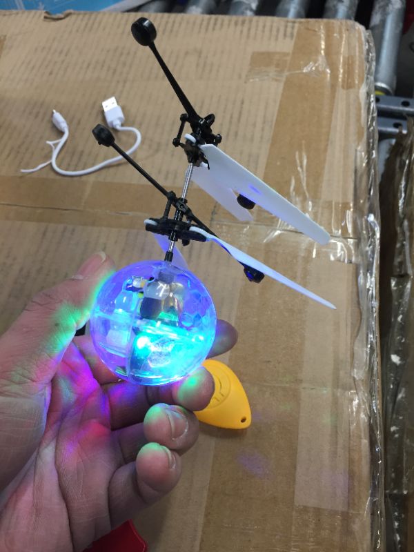 Photo 2 of Magic Flying Ball Toy - Infrared Induction RC Drone, Disco Light LEDs, Rechargeable Helicopter - Unique Kids & Adults, Him & Her Valentines Day Idea 2022, Best Teenage Girl, Teen Boy & Tweens Present
