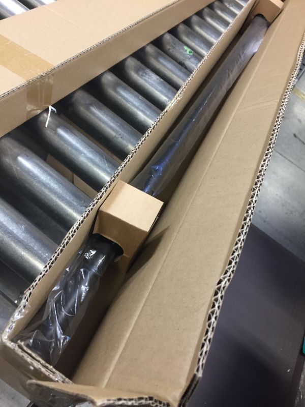 Photo 1 of AmazonBasics Tension Curtain Rod - 54-90", Black