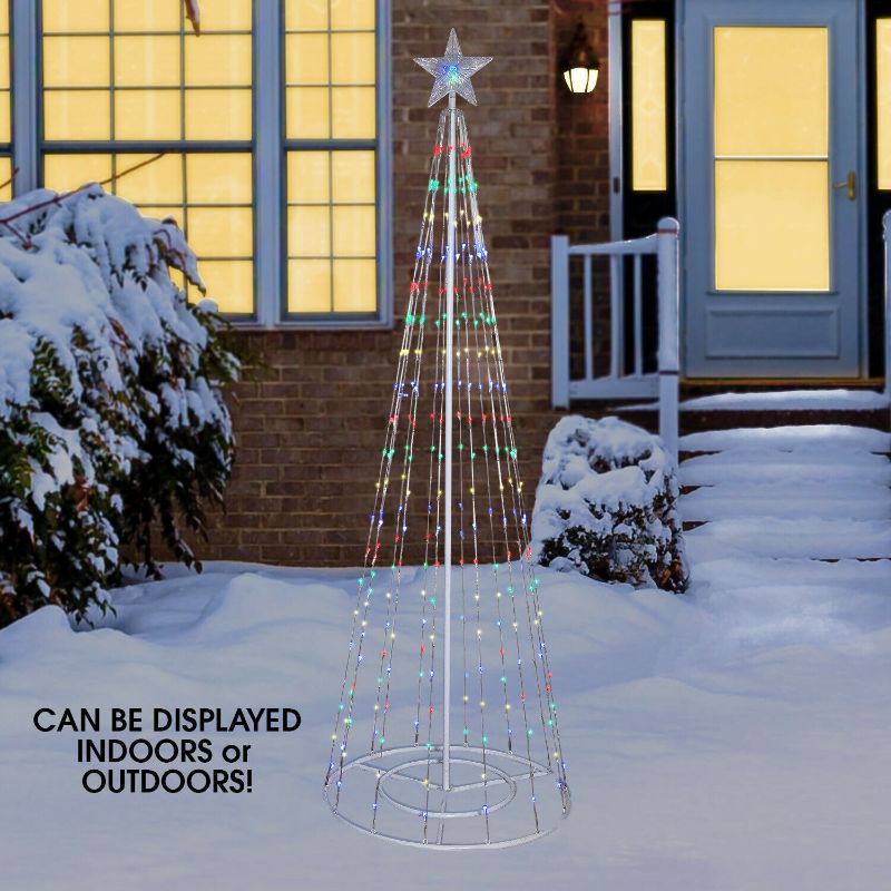 Photo 1 of Artificial Christmas Tree with Glowing Star Topper

