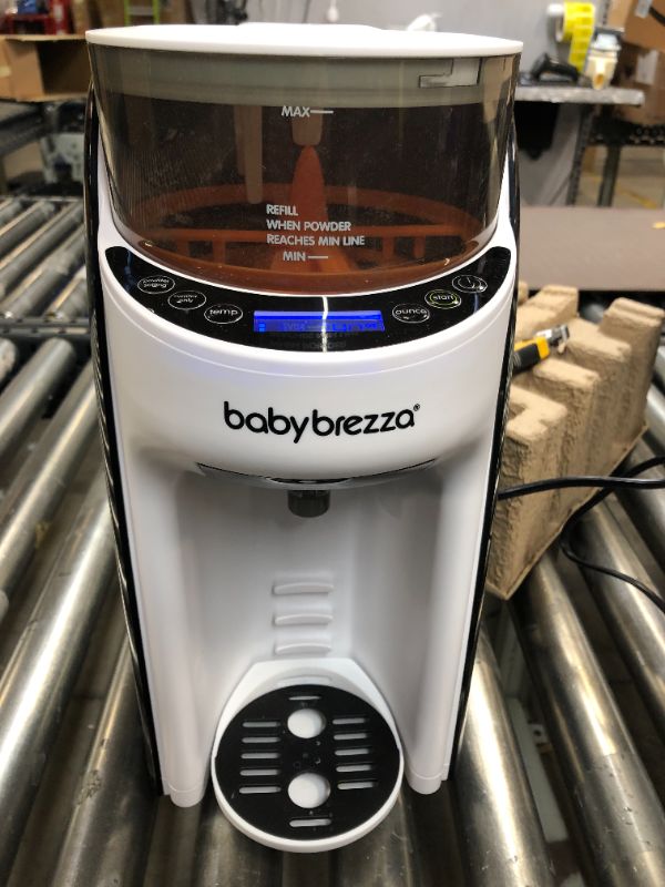 Photo 2 of Baby Brezza New and Improved Formula Pro Advanced Dispenser Machine
(( OPEN BOX ))
** NORMAL USE **