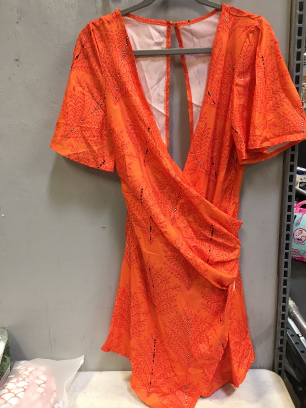 Photo 2 of  Cross wrap romper. Never worn Size XL 