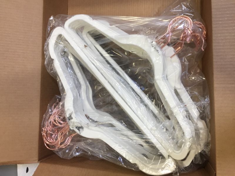 Photo 1 of box of hangers 