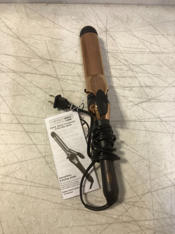 Photo 1 of INFINITIPRO BY CONAIR Rose Gold Titanium 1 1/2-Inch Curling Iron
1.5 Inch (Pack of 1)