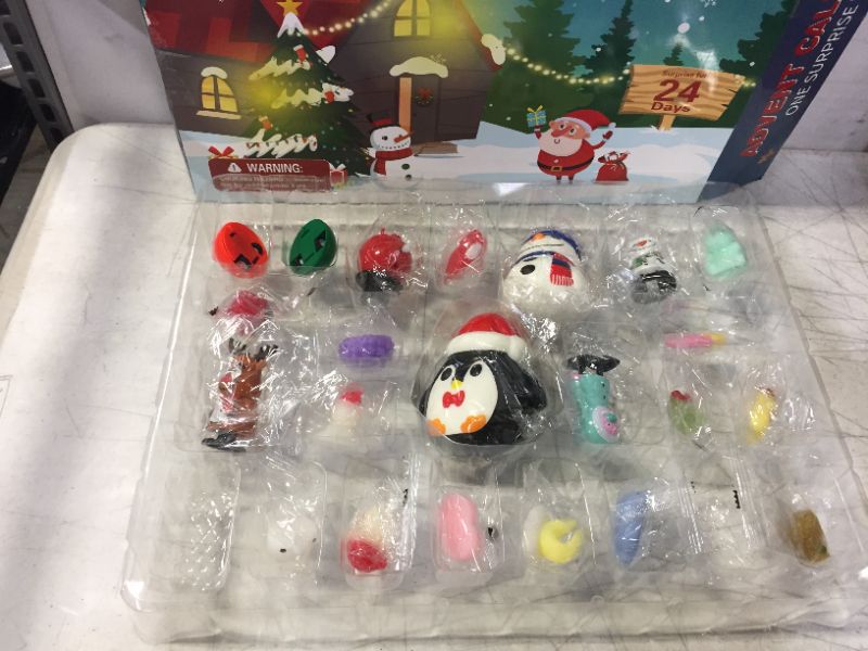 Photo 2 of 2021 Advent Calendar Kids Christmas Countdown Calendar 24 Days Mochi Squichy Toys Pull Back Cars Wind Up Toys Christmas Erasers Christmas Party Favors for Girls Boys