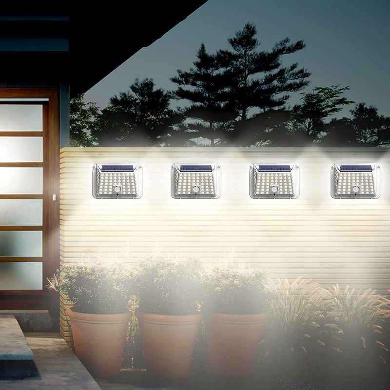 Photo 1 of Zuppnm New Solar Motion Sensor Lights,with 90 Super LED and 3 Lighting Modes.Solar Lights Outdoor,Waterproof Solar Security Lights for Front Door,Yard,Garage,Deck.Solar Fence Wall Lights(4 Pack)

