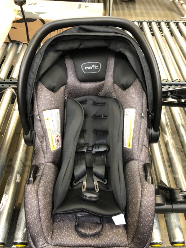 Photo 2 of Evenflo Pivot Modular Travel System With SafeMax Car Seat
