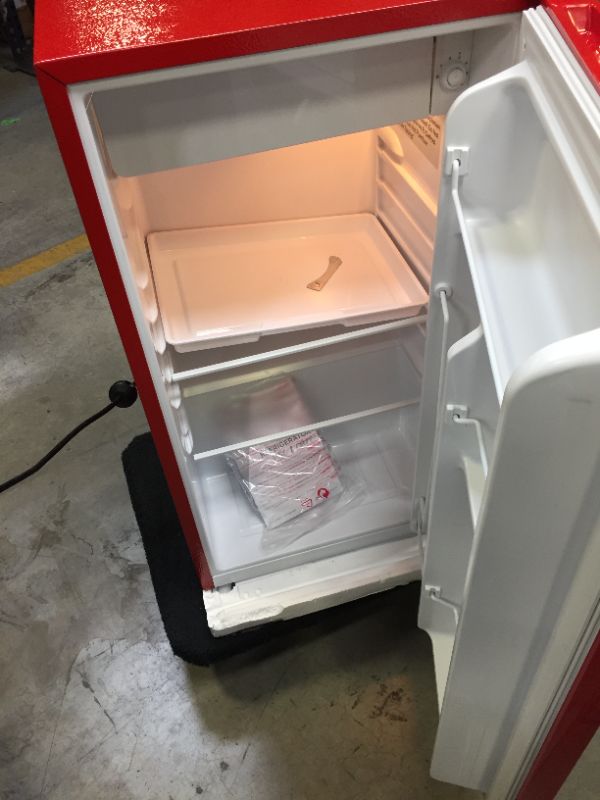 Photo 3 of Frigidaire 3.2 Cu. Ft. Retro Compact Refrigerator with Side Bottle Opener EFR376, Red
makes a noise when turned on 