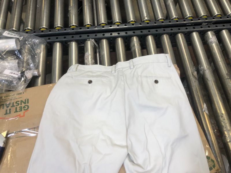 Photo 4 of Amazon essentials chino pants sz 35X29 