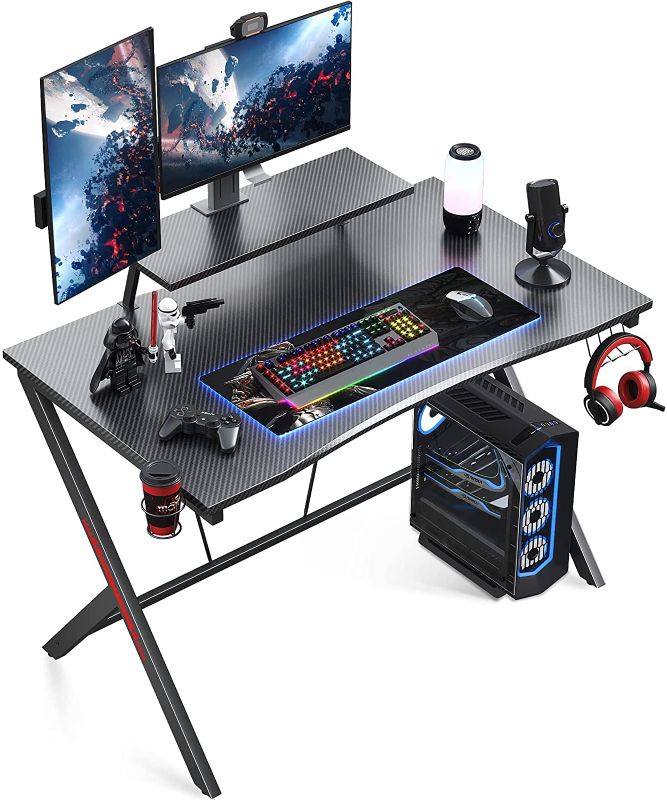 Photo 1 of MOTPK Gaming Desk 39 Inch, Computer Desk with Monitor Shelf, Gaming Table Carbon Fiber Coated, Gift Ideas, Gamer Desk with Cup Holder and Headphone Hook, Black
