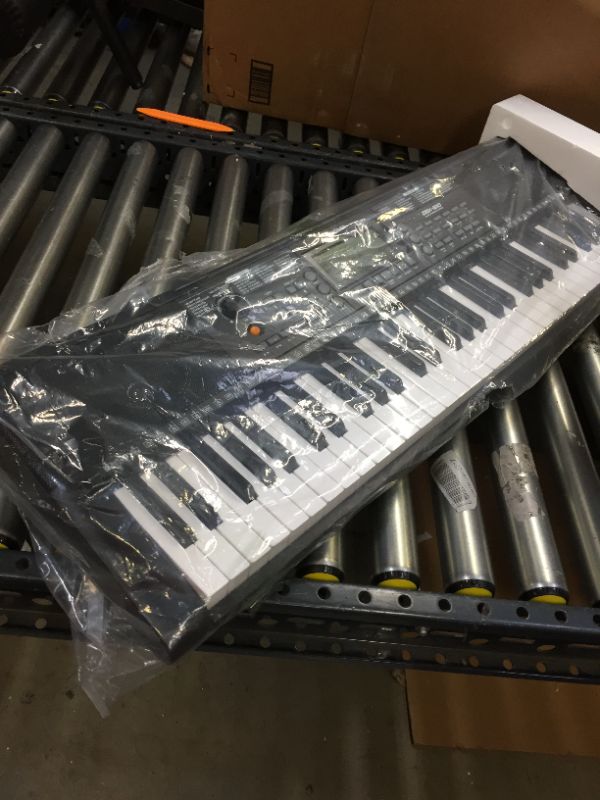 Photo 1 of Donner DEK-610 61-Key Electronic Portable Keyboard Piano for Beginners with stool 

