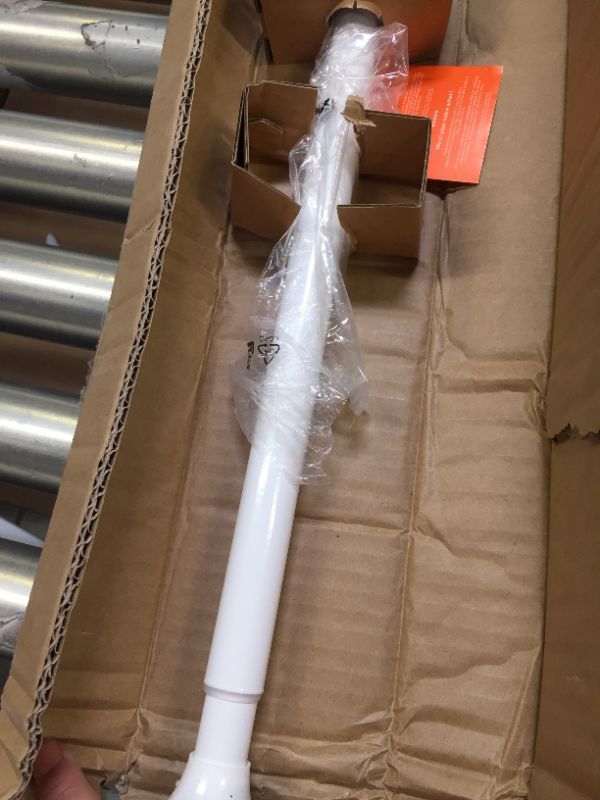 Photo 2 of AmazonBasics Tension Curtain Rod - 78-108", White