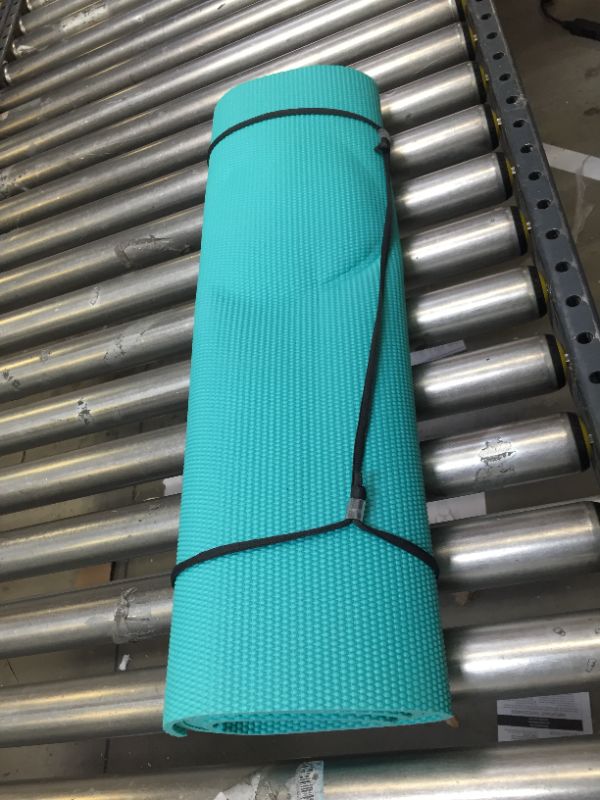 Photo 1 of 24 INCH WIDE TEAL YOGA MAT WITH STRAPS.