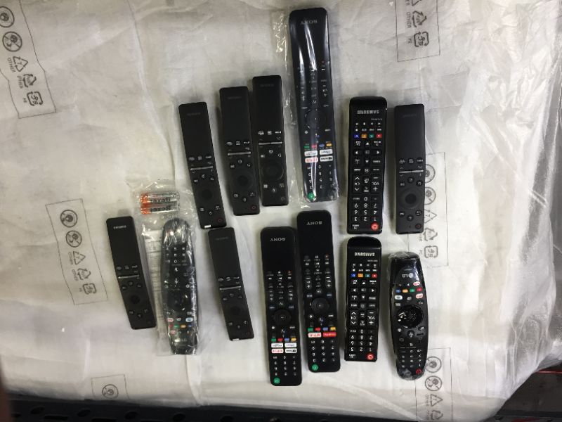 Photo 1 of bundle of tv remotes 