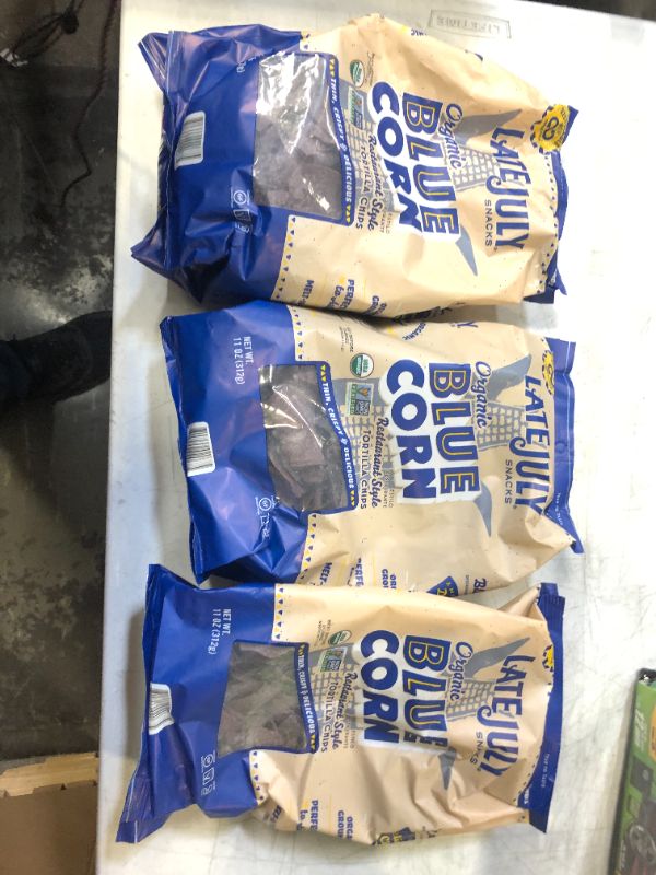 Photo 1 of 3 bags of blue tortia chips 