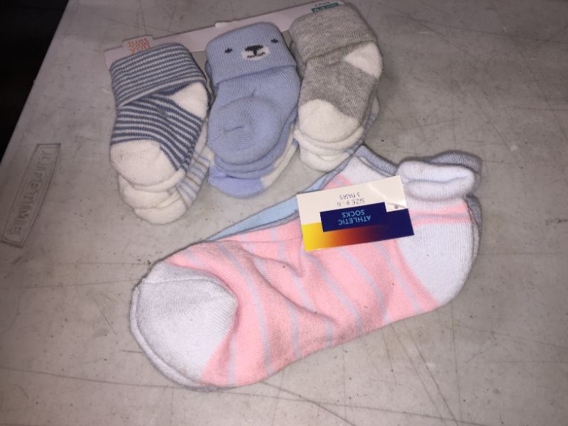 Photo 1 of 2 PACKS OF SOCKS BABY AND ADULT